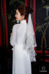 Elegant traditional bridal ao dai with 3d floral