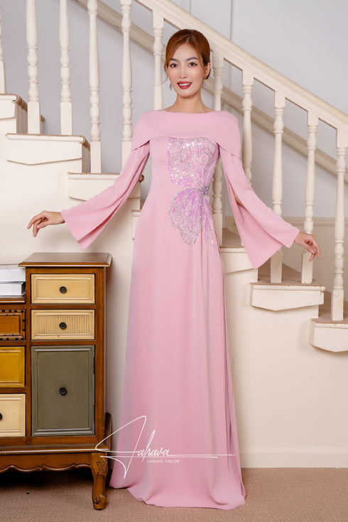 Modern pink ao dai features stunning slit sleeves