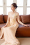 Modern ao dai features handcrafted flower beaded