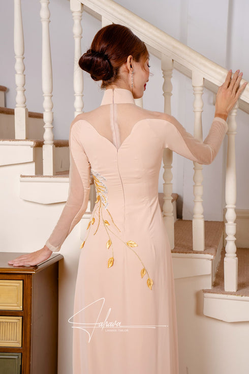 Modern ao dai features handcrafted flower beaded
