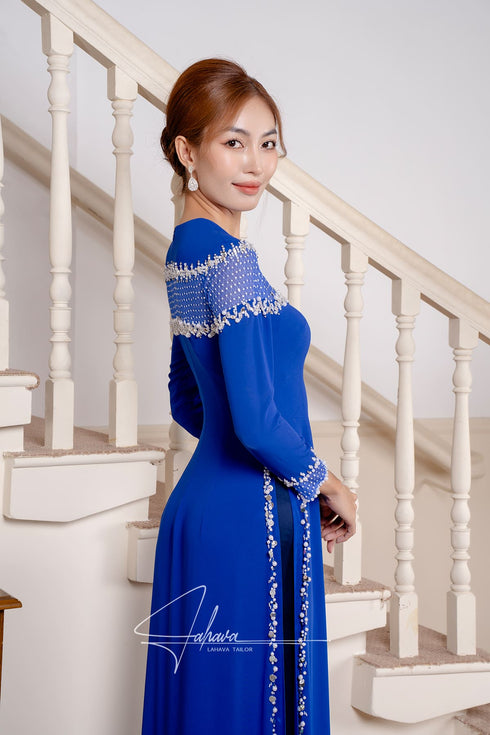 Cobalt blue ao dai with modern cut-out