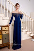 Dark blue ao dai features a luxurious beading design