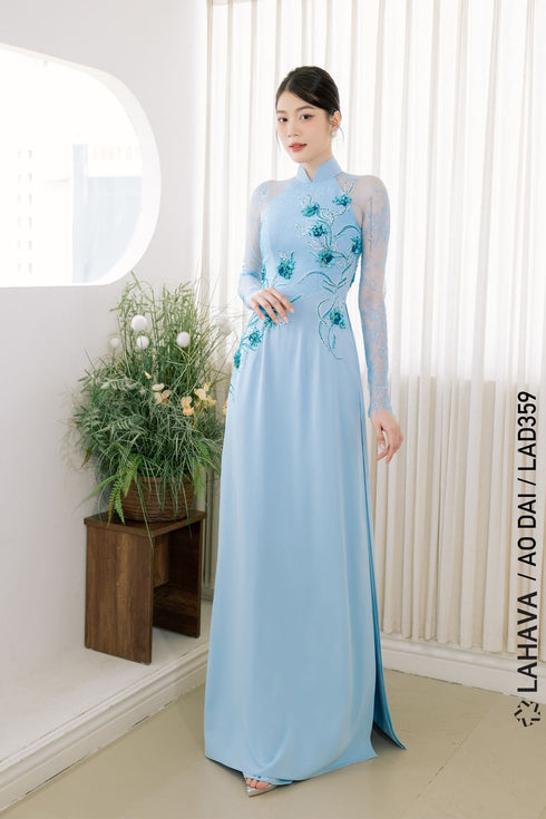 Sweet turquoise Ao dai features floral beadwork