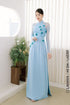 Sweet turquoise Ao dai features floral beadwork