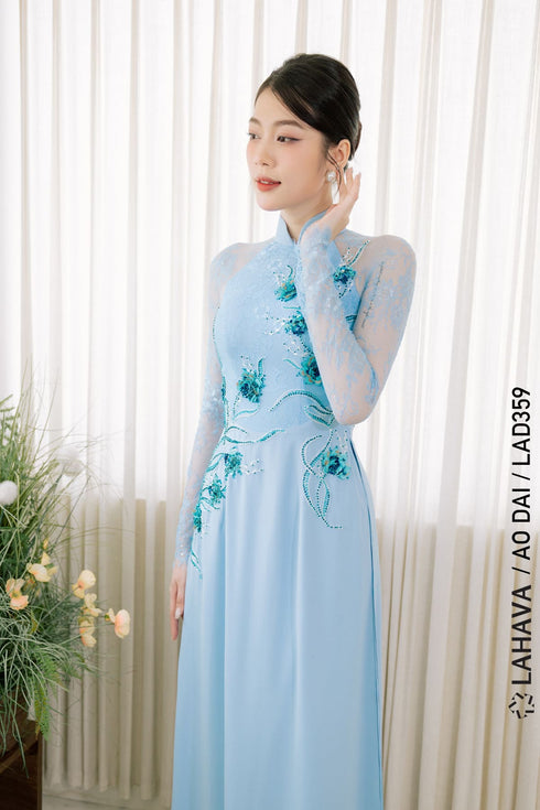 Sweet turquoise Ao dai features floral beadwork