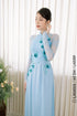 Sweet turquoise Ao dai features floral beadwork