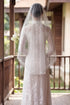 Elegant White Lace Bridal Ao Dai with Matching Veil