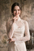 Elegant White Lace Ao Dai with Draped Bodice Detail