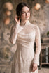 Elegant White Lace Ao Dai with Draped Bodice Detail