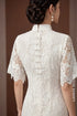 Elegant White Lace Modern Ao Dai with Flared Sleeves and Pearl Accents