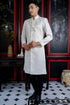 Modern men's ao dai with embroidery lace