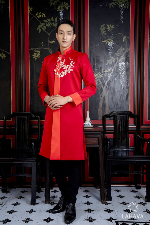Modern men's ao dai with floral patterns