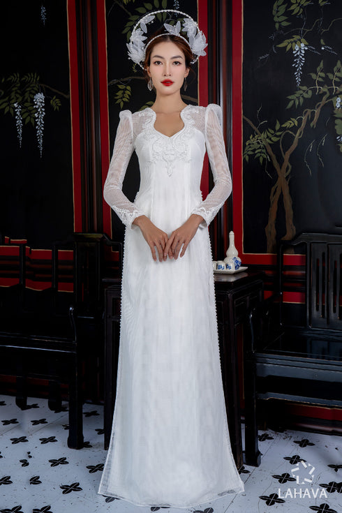 Modern wedding ao dai features a timeless white color