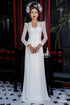 Modern wedding ao dai features a timeless white color