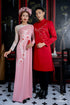Pink bridal ao dai is adorned with 3d flowers
