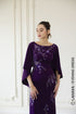 Purple column dress with cape sleeves