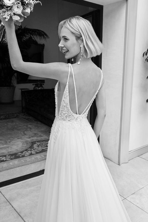 Elegant spaghetti strap wedding gown