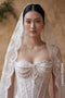Vintage-Inspired Lace Mermaid Wedding Gown with Elegant Pearl Draping