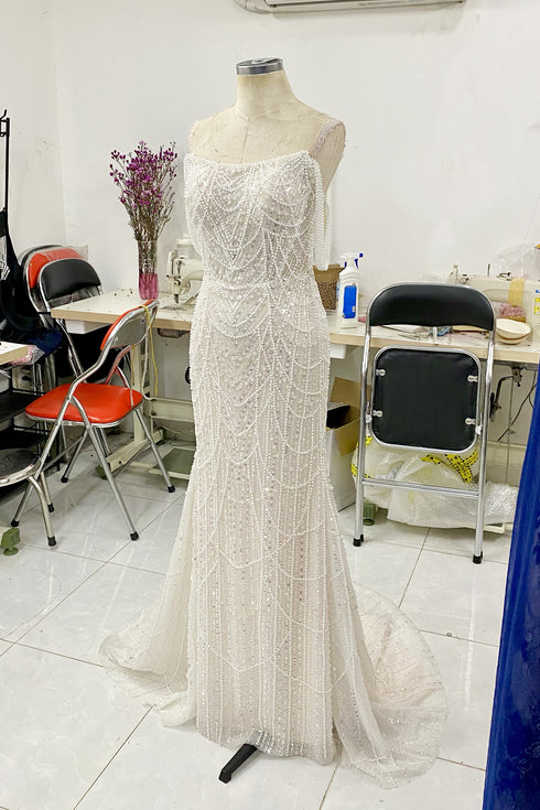 Gatsby-inspired sheath bridal gown with draped pearls