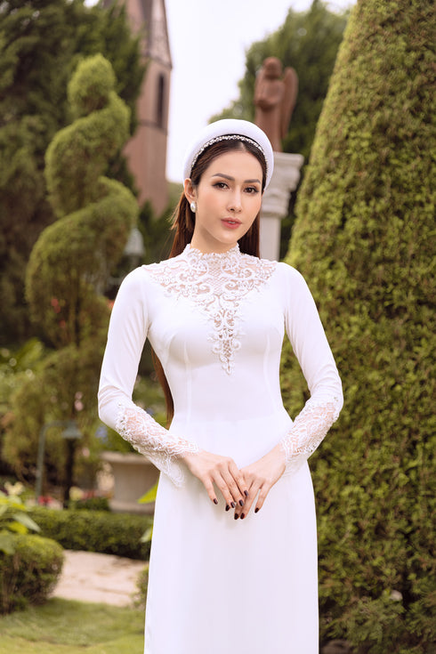 White modern ao dai cut out on the back