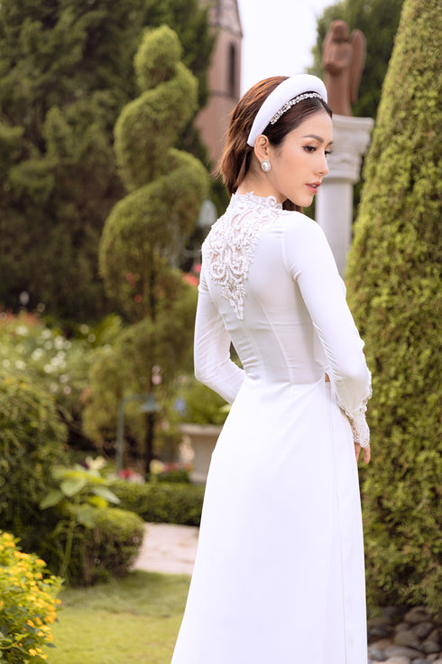 White modern ao dai cut out on the back