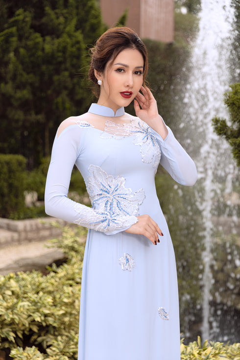 Blue ao dai with flower patterns