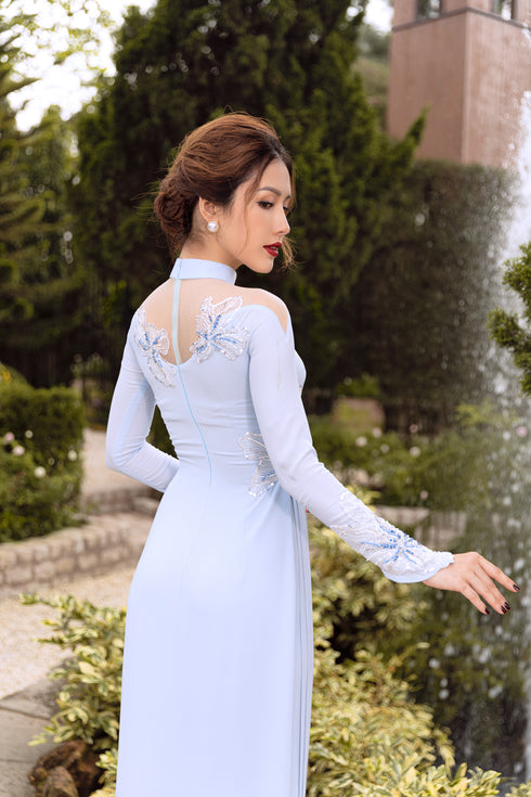 Blue ao dai with flower patterns