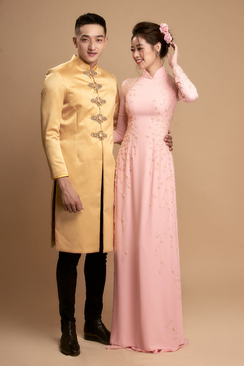 Pink cut-out ao dai with beading