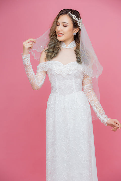 White modern ao dai with embroidery lace