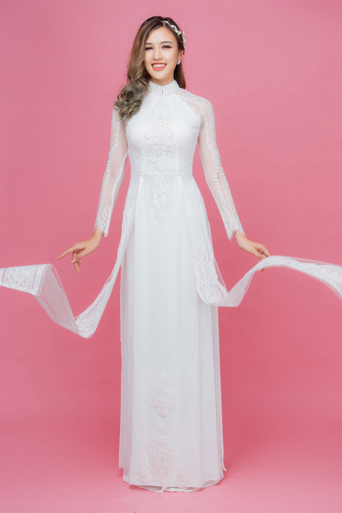 White modern ao dai with lace embellished