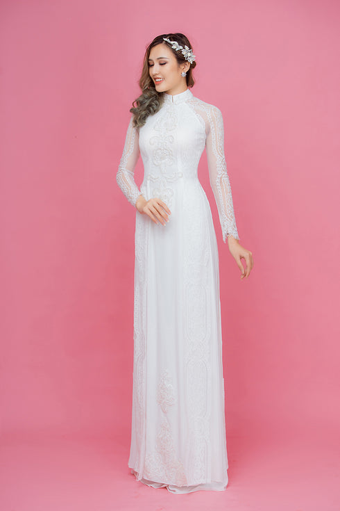 White modern ao dai with lace embellished