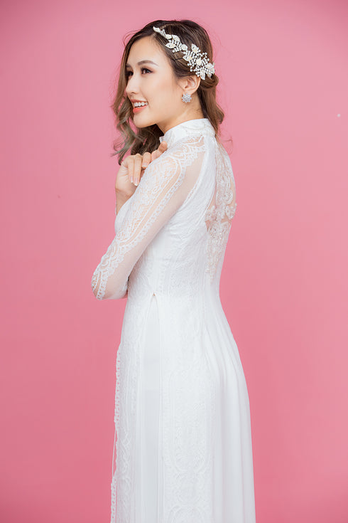 White modern ao dai with lace embellished