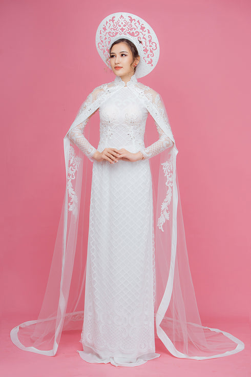 Gorgeous white modern ao dai with cape