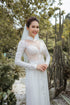 White modern ao dai with laces