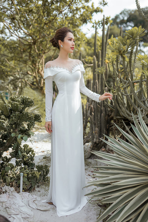 White gentle ao dai with exquisite beaded
