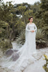 Dreamy ao dai with a long tulle cape