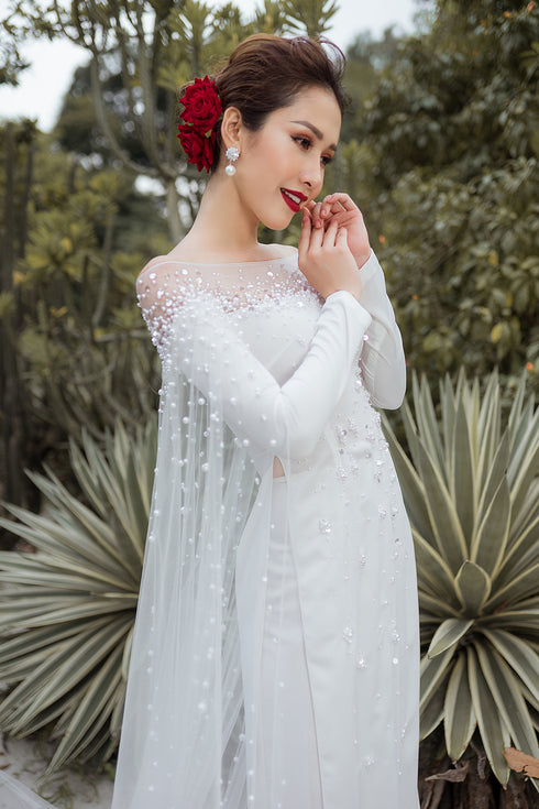 Dreamy ao dai with a long tulle cape