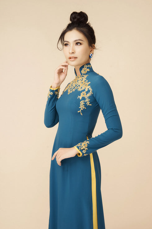 Elegant blue ao dai with gold beading