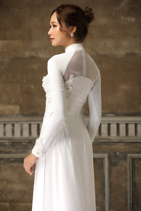 Modern raglan ao dai with 3D floral embellished