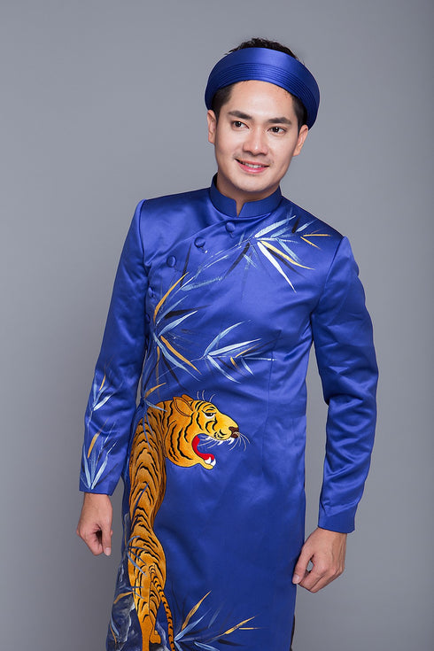 Blue ao dai with a tiger embroidered
