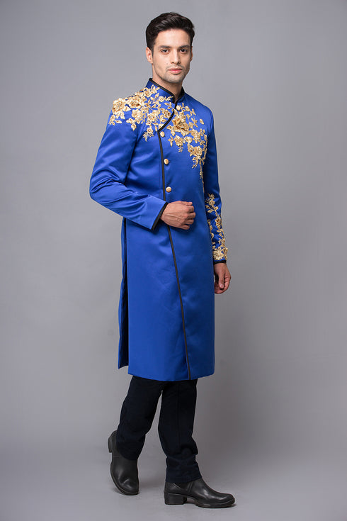 Blue men ao dai with 3D flowers embellished